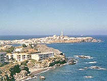 The harbour and the light tower in Cabo de Palos, Costa Calida