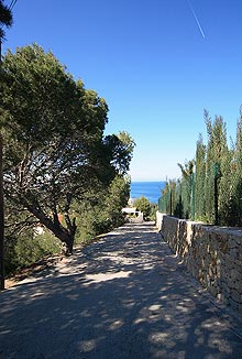 A country road in Las Rotas near Denia, Costa Blanca, with some sea view