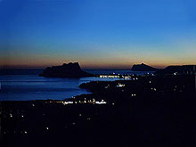 Calpe's skyline after sunset, in winter, seen from a hill above