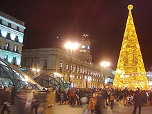 Madrid in winter: the Plaza del Sol Place in the center of Madrid, with artificla Christmas tree